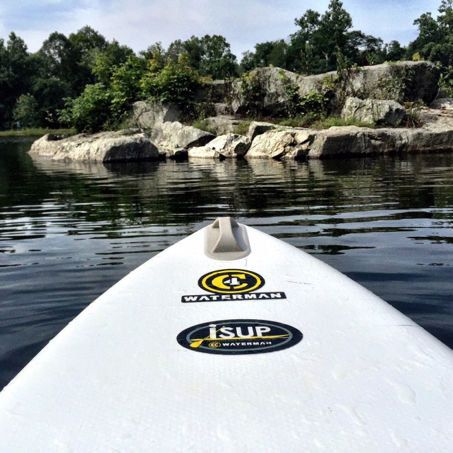 About to do a pose... but first, a photo (of my board and the rock in front of me).