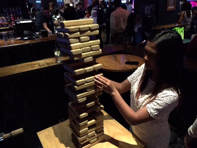 Intern #1 going for it at the giant Jenga.