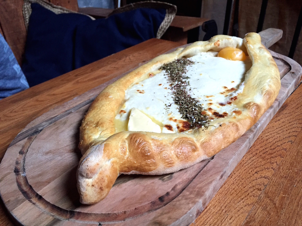 Compass Rose's version of the Georgian dish khachapuri (cheese-filled bread with egg and butter).