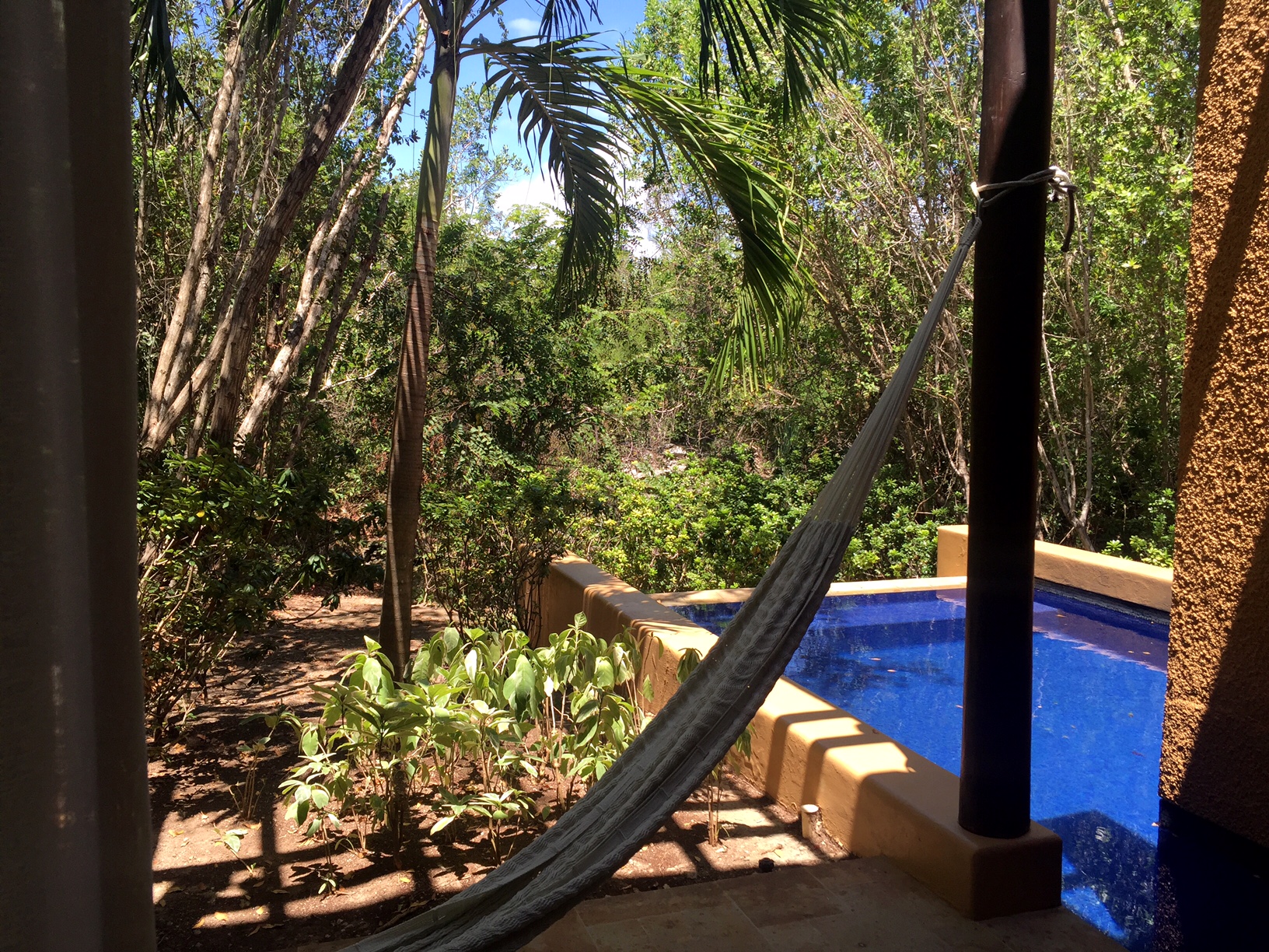 Backyard of our villa. I love hammocks.